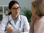 Questions for your doctor about Medication for Acid Reflux Doctor speaking with patient about medication for acid reflux