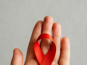 Is there an HIV Cure? Medical researcher analyzing HIV samples for cure research in a lab.