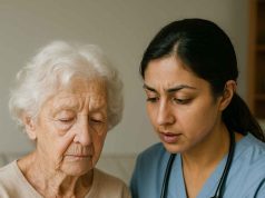 Educating Alzheimer’s Caregivers about Diabetes Caregiver monitoring diabetes in an elderly Alzheimer’s patient using glucose meter at home.