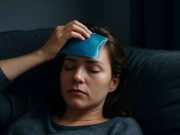 Migraine Relief That Works: Triggers, Treatments & Tips Woman lying in dark room with ice pack on head during migraine