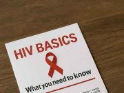 HIV Basics: What Every Patient and Caregiver Needs to Know Doctor and patient talking about HIV basics and care plan.