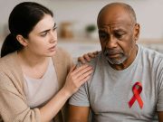 The Challenges of Being An Aids Caregiver AIDS caregiver supporting HIV patient with medication and care